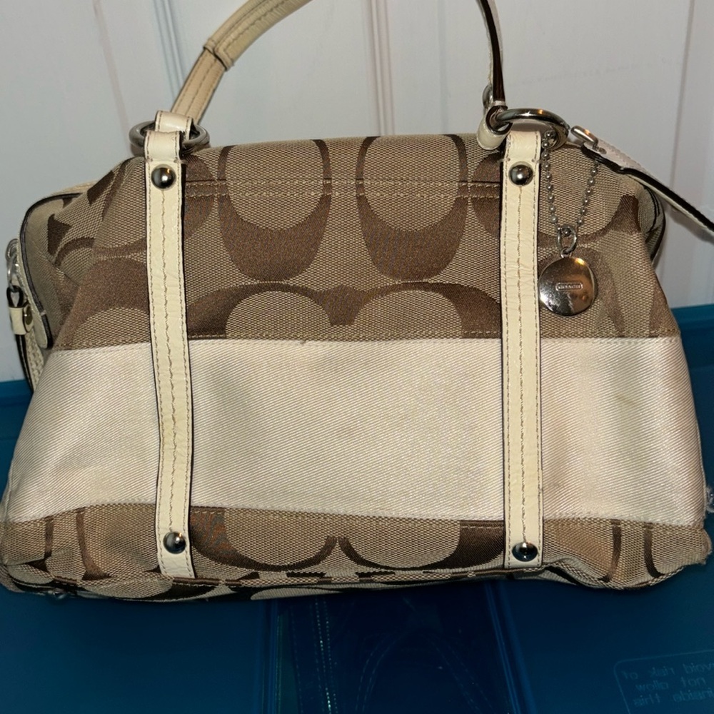 White and brown coach bag